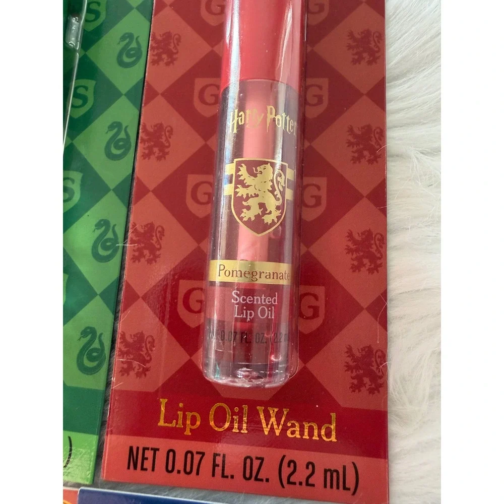 Harry Potter Hogwarts House Scented Lip Oil Wand Set 4 Pack Bergamot Vanilla NIB